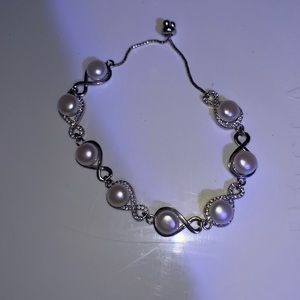 Real Pearl bracelet with diamonds around every other one